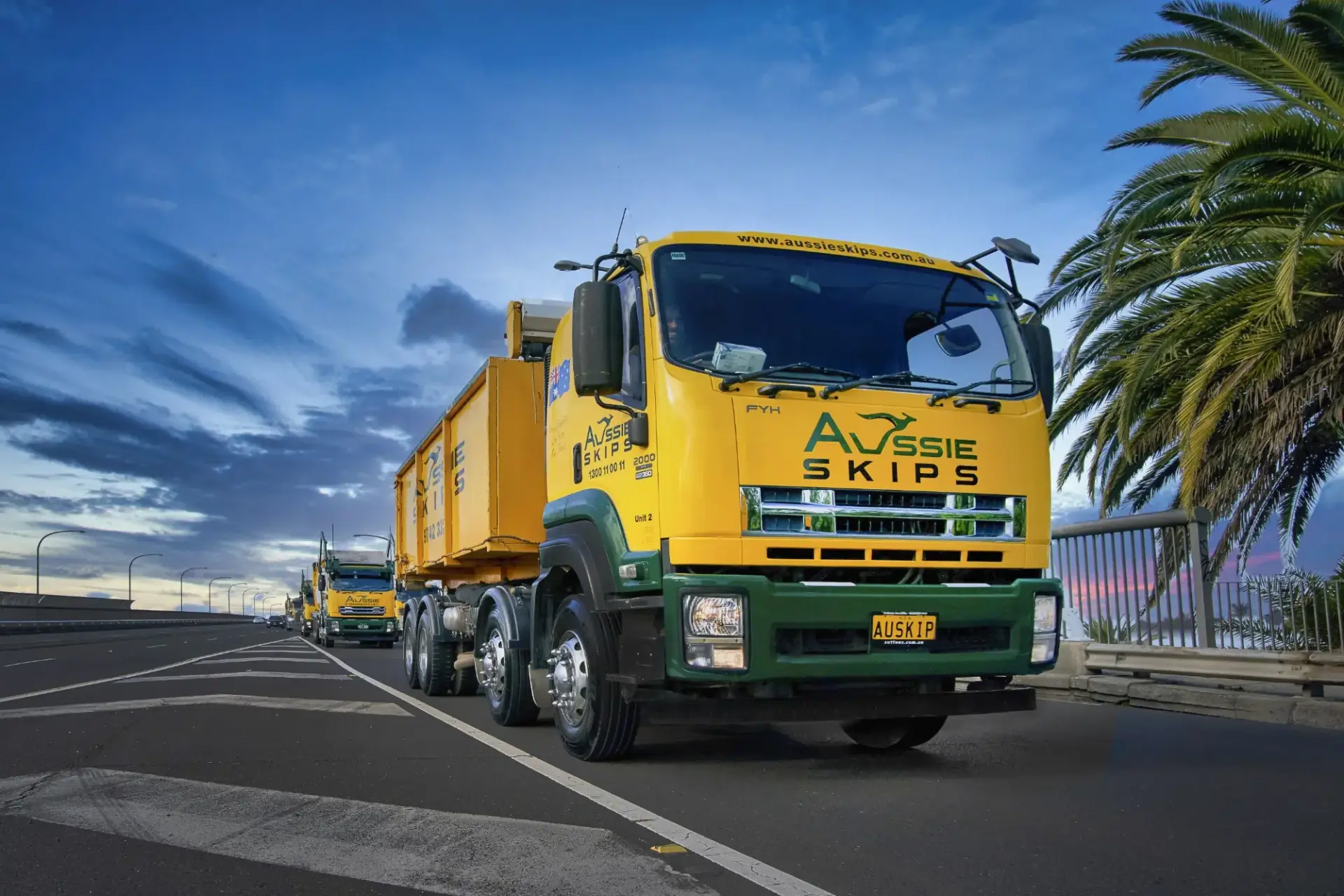 Aussie Skips truck delivering a skip bin in western Sydney